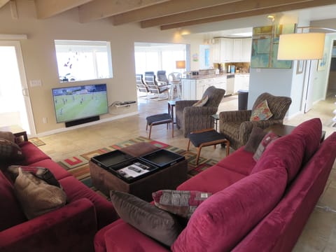 Living room has 60" TV, blu-ray player and sound system plus ocean views!