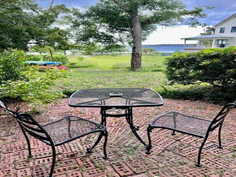 Shady patio just outside the bay room door. Perfect for morning coffee time.