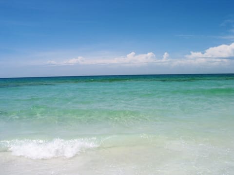 Clear emerald green water and sugar white sands