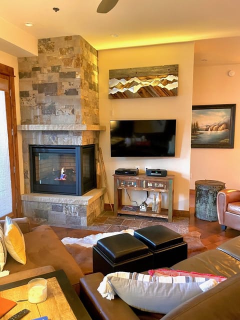 Create warmth and comfort with the fireplace and mountain scene glow!