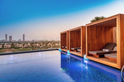 Outdoor pool, free cabanas, pool umbrellas