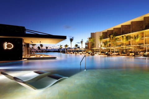 3 outdoor pools, open 8 AM to 8 PM, cabanas (surcharge), pool umbrellas