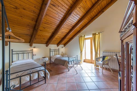 Triple Room | Hypo-allergenic bedding, down comforters, in-room safe