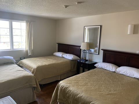 Two Queen Beds with Sofa Bed | In-room safe, iron/ironing board, free WiFi, alarm clocks