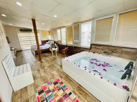 Shower, free toiletries, hair dryer, slippers