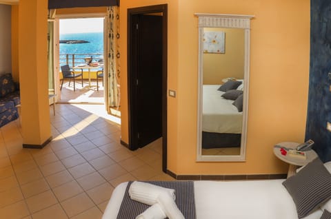Junior Suite, Jetted Tub, Sea View | Minibar, desk, soundproofing, iron/ironing board