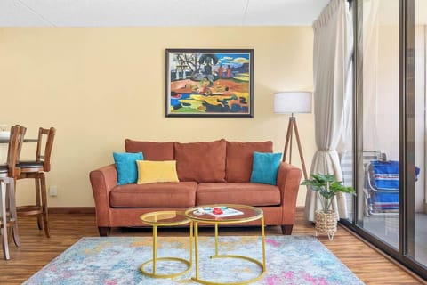 Living room with pull-out sleeper sofa and coffee table.