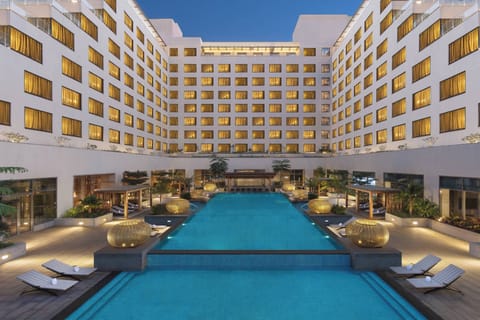Outdoor pool, open 7:00 AM to 10:00 PM, free cabanas, pool umbrellas