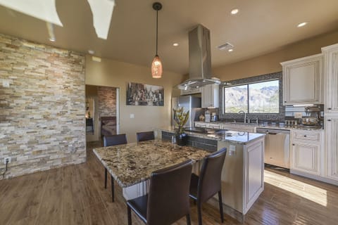 Cook-top faces entire open casita with views in every direction, dine-in kitchen