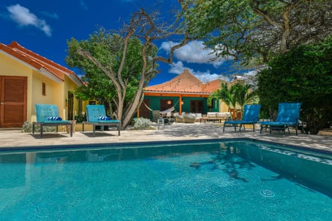 Immerse yourself in the breathtaking Aruban architecture of our home, where every detail tells a story of island elegance and timeless charm.
