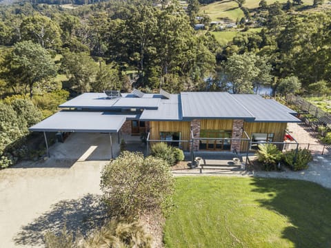 The property overlooks the Huon River, with access from the end of the street