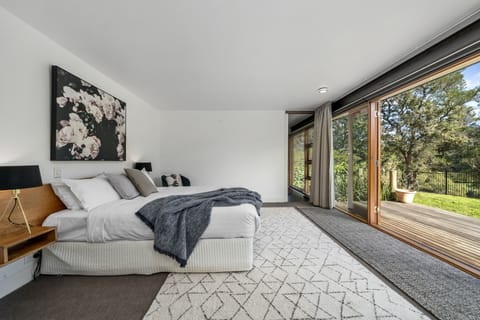 The master suite includes an ensuite, dressing room and its own deck