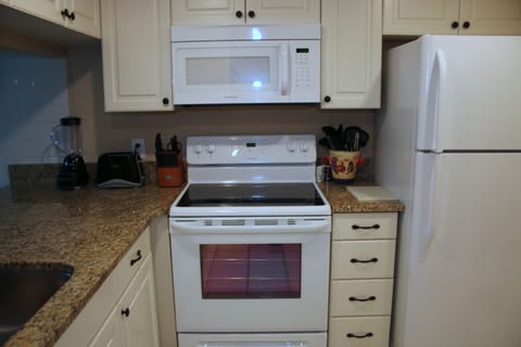 Kitchen features brand new granite countertop, all new appliances.