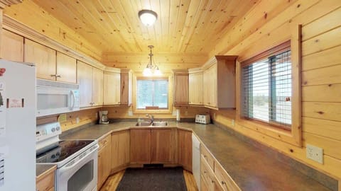 The kitchen is equipped with everything that you might need to cook a yummy meal.