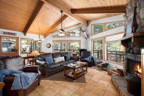 Relax by the fire and enjoy the trees, birds, sun, snow and sky.