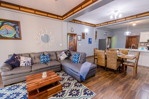 Living Area with 42' TV and floor to ceiling glass doors 
