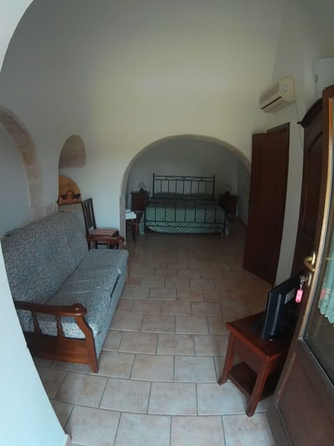 Standard Double Room (Trullo) | Living area | Flat-screen TV