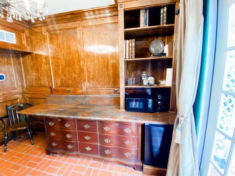 Microwave, coffee/tea maker, cookware/dishes/utensils, paper towels