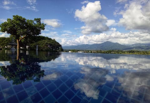 Outdoor pool, open 7 AM to 9 PM, sun loungers