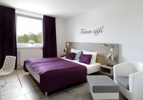 Comfort Triple Room | Minibar, in-room safe, desk, cribs/infant beds