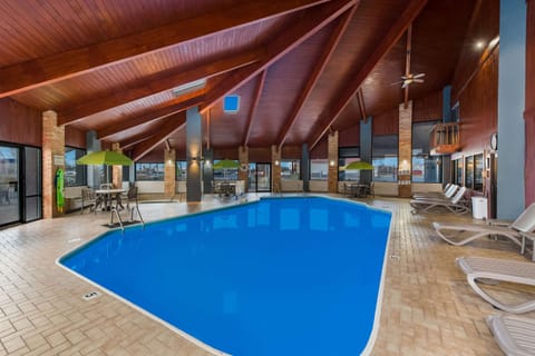 Indoor pool, open 10:00 AM to 9:00 PM, pool umbrellas, sun loungers