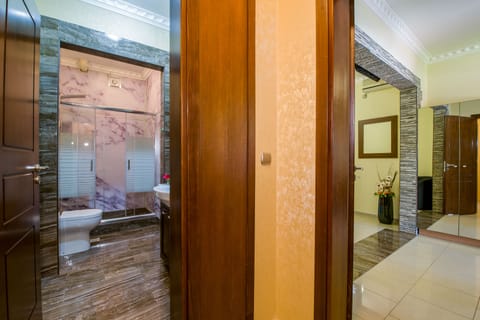 Junior Suite (4 Adults) | Bathroom | Shower, free toiletries, hair dryer, towels