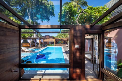 Outdoor pool, open 8:00 AM to 10:00 PM, pool umbrellas, sun loungers