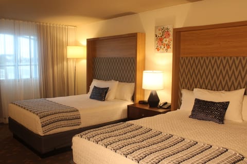 Desk, iron/ironing board, free cribs/infant beds, rollaway beds