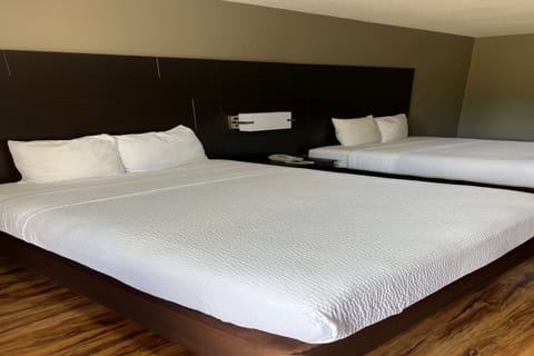 Standard Room, 2 Queen Beds | Iron/ironing board, free WiFi, bed sheets