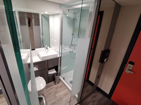 Shower, free toiletries, towels, soap