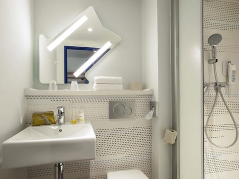 Shower, eco-friendly toiletries, hair dryer, towels