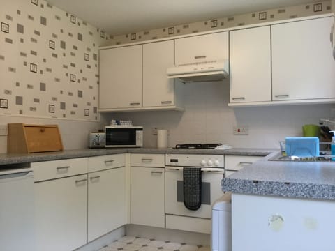 Apartment | Private kitchen | Full-size fridge, microwave, oven, stovetop