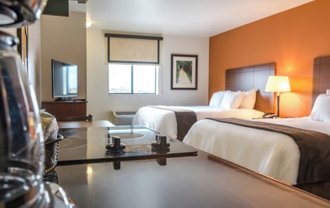 Premium bedding, pillowtop beds, blackout drapes, iron/ironing board