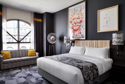 Deluxe King | Premium bedding, down comforters, in-room safe, blackout drapes