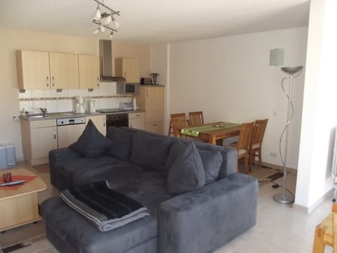 Family Condo, 1 Bedroom, River View | Living area | TV, toys