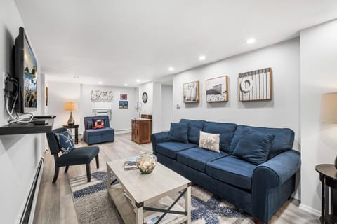 Living Room with Queen Sofa Bed featuring a Deluxe Foam Mattress