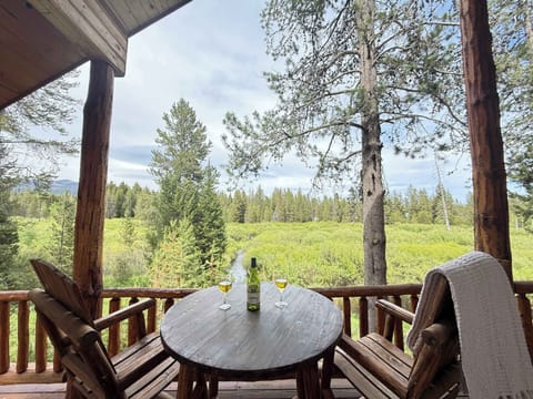 Chair on the porch overlooking the creek.