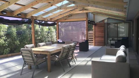 Outdoor HUGE Verandah area. Outdoor Blinds all around. 