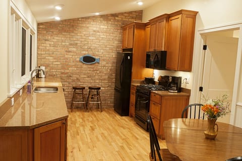 Kitchen is bright and updated . All windows face the lake.