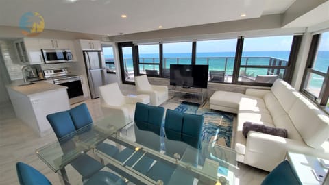 Great Room includes Living, Dining and Kitchen Area with access to private balcony