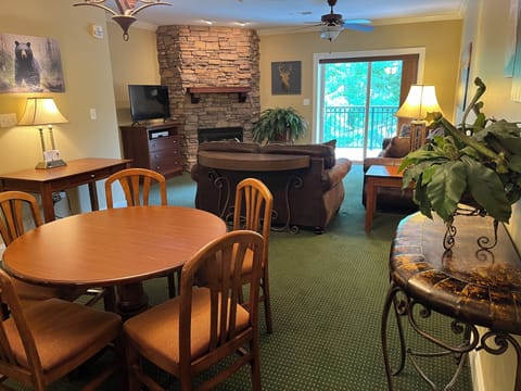 Open concept living room with gas fireplace.
