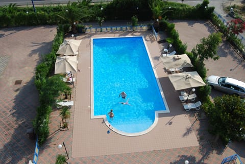 Outdoor pool, a rooftop pool, sun loungers