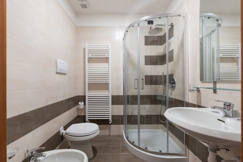 Deep soaking tub, rainfall showerhead, hair dryer, bidet