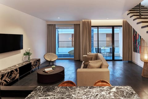 Loft, 1 King, Balcony | Living area | 42-inch LED TV with satellite channels, TV