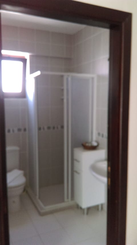 Shower, free toiletries, hair dryer, slippers