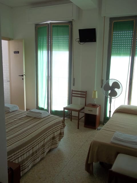 Triple Room, Balcony | In-room safe, desk, free WiFi, bed sheets