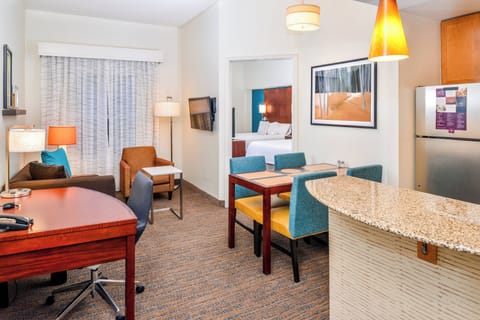 Suite, 1 Bedroom | Living area | 42-inch LCD TV with cable channels, TV, iPod dock
