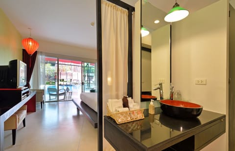 Deluxe Room, Pool Access | Bathroom | Free toiletries, hair dryer, bathrobes, slippers