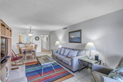 You can see the ocean from the sofa bed and the recliner. Uncluttered.