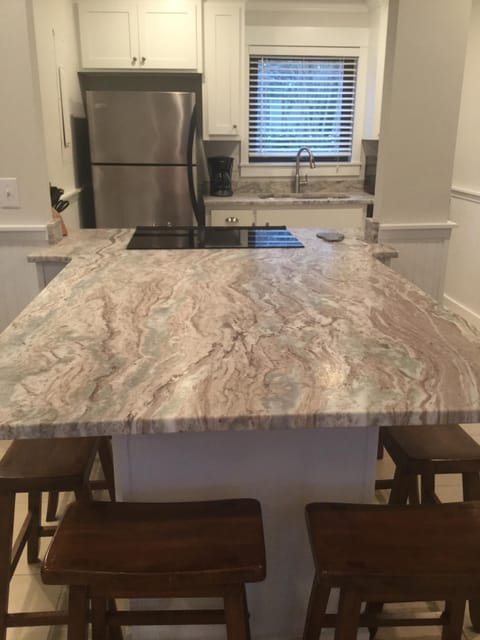 Awesome counters with six bar stools
